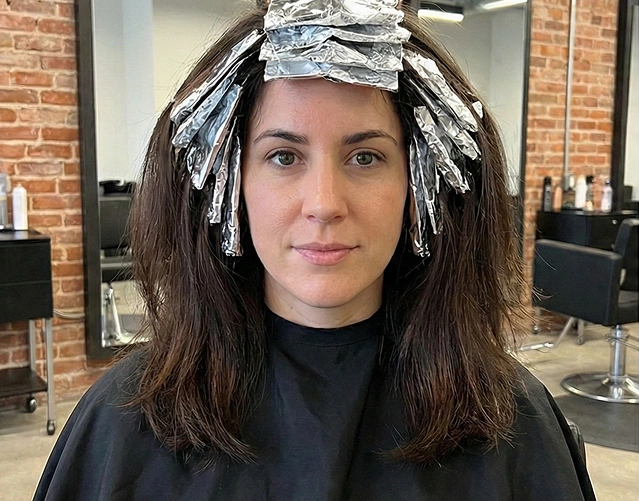 Person with foils in hair
