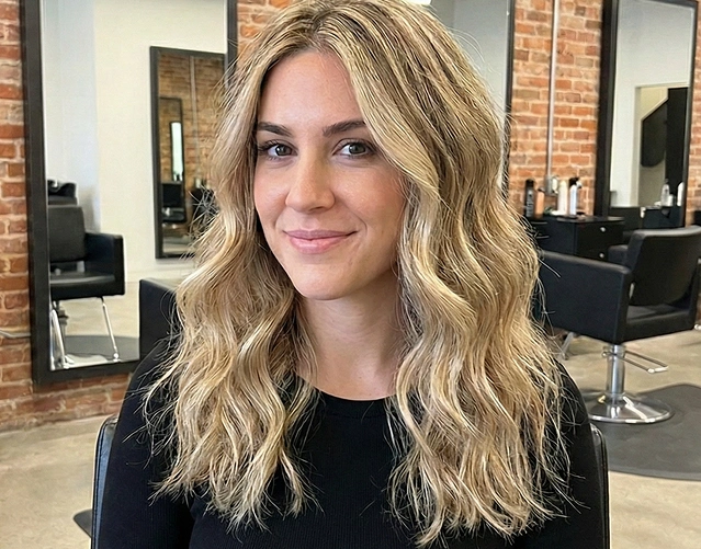 Woman with wavy blonde hair